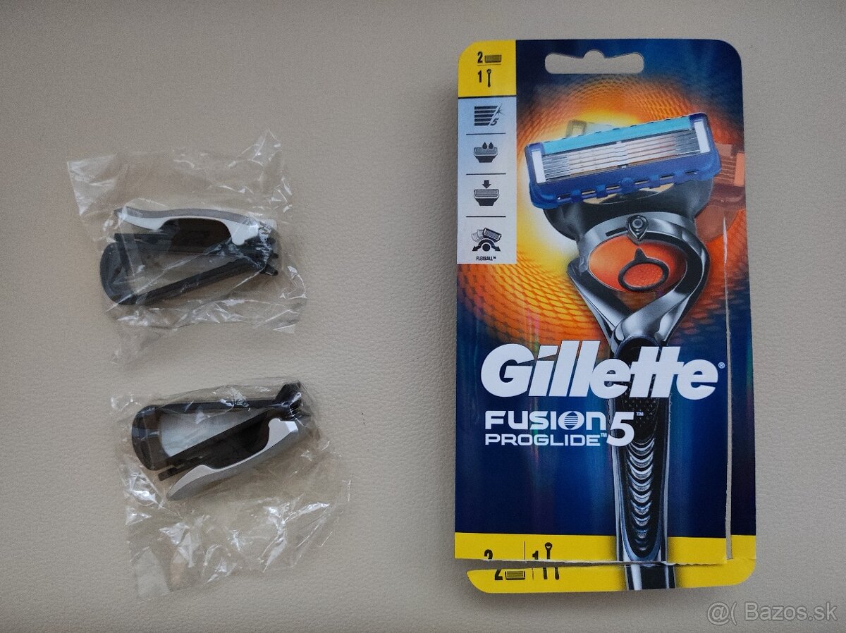 Holiaci strojček Gillette, Držiak na okuliare, Držiak telefó