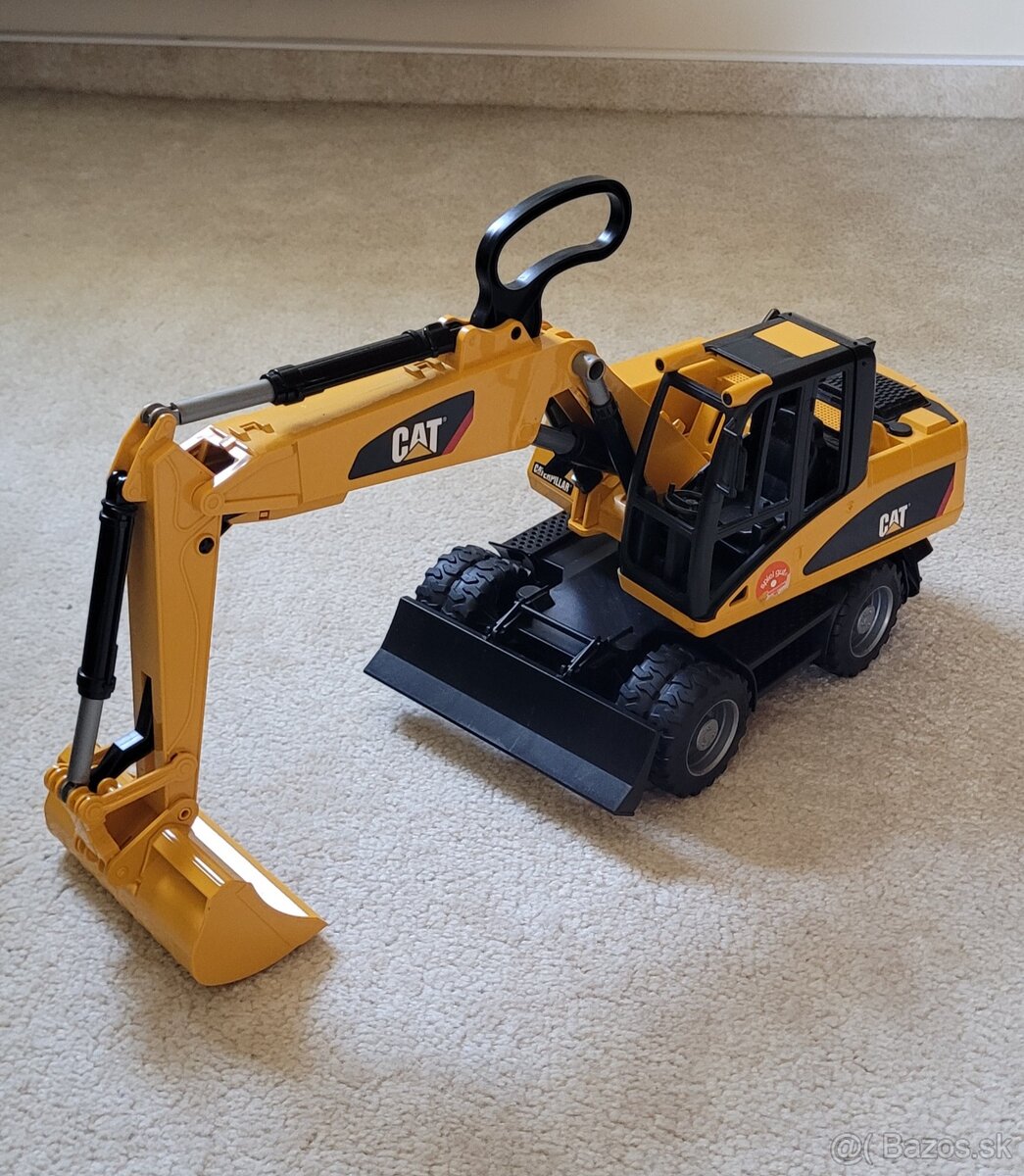 Kolesovy bager Bruder CAT Caterpillar