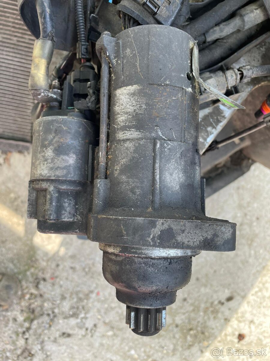 Štarter Passat B6 2.0TDI