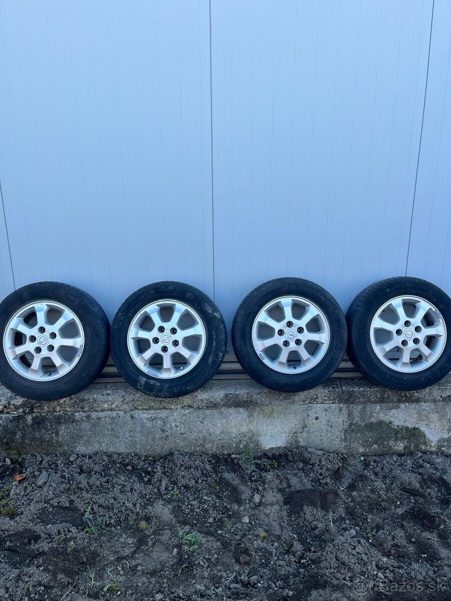 Sada Aludisky 6JX15H2 ET43 s Michelin pneu na Opel Zafira