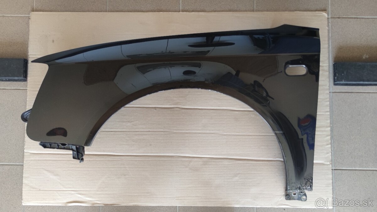 Ľavy predný blatník Seat Exeo