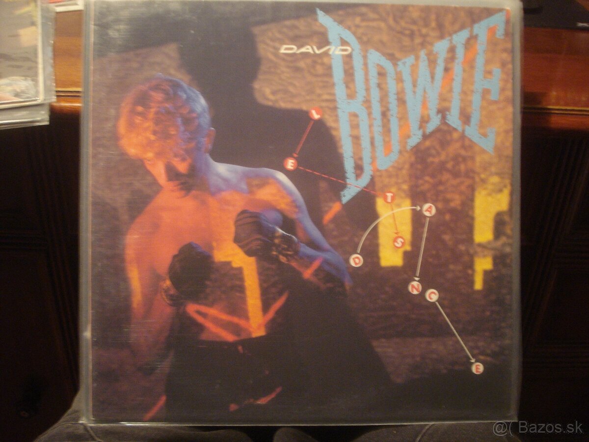 LP BOWIE COCKER B.HOLLY FOREIGNER ELO BYRDS E.JOHN MADONNA