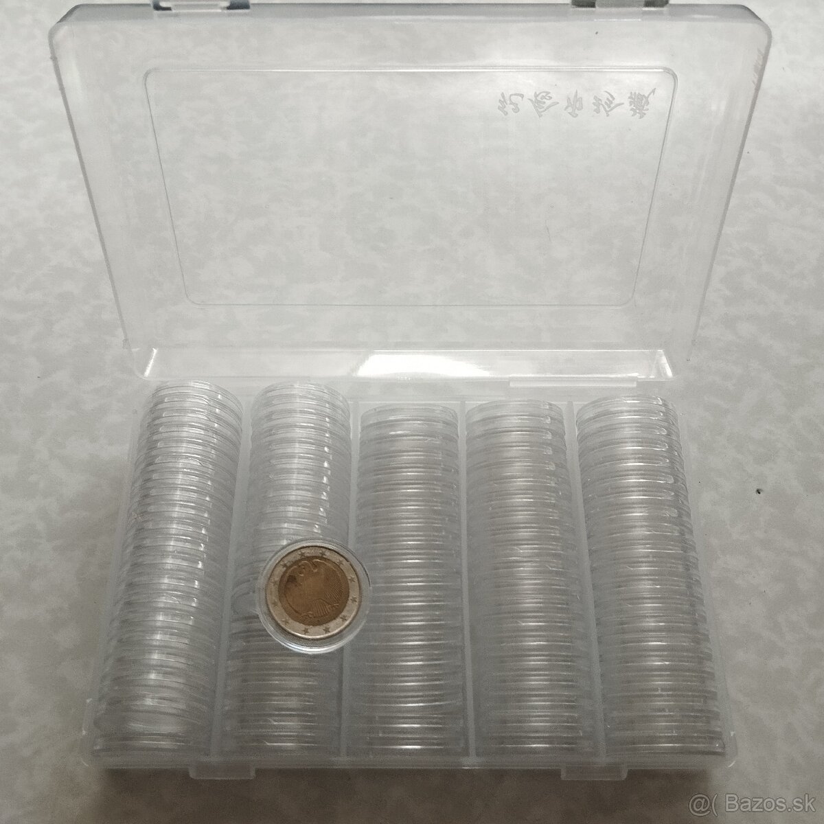 Predám box na 2€ mince s kapsľami