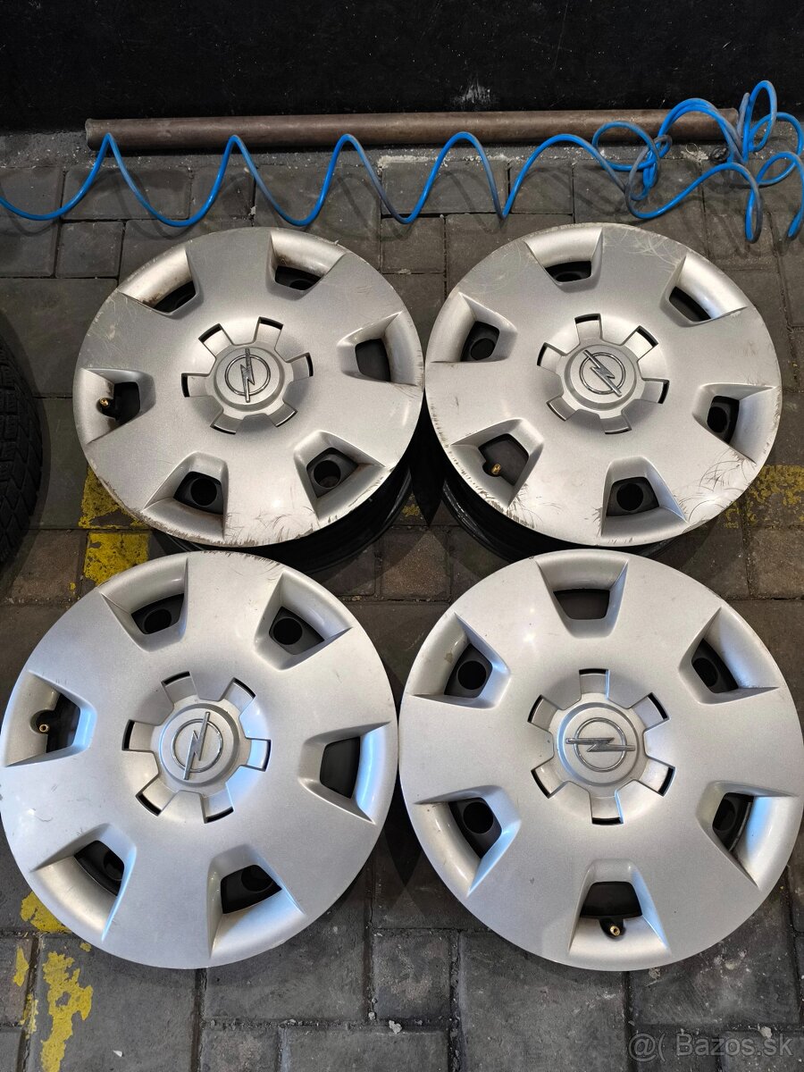 4X100 R15 Opel disky +puklice