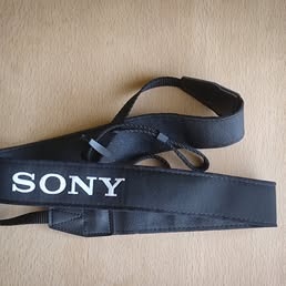 Sony Alpha popruh ku kamere