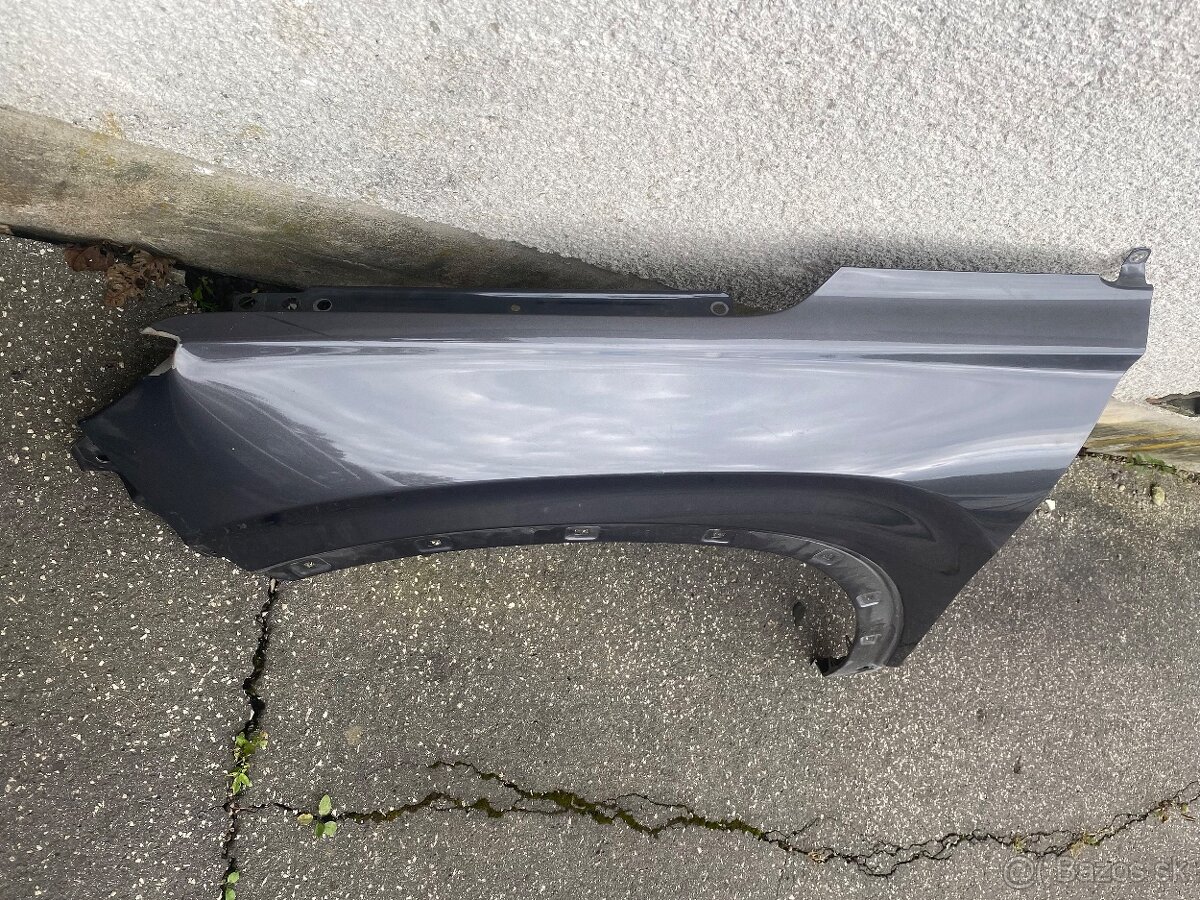 Hyundai Santa Fe IV ľavý predny blatnik