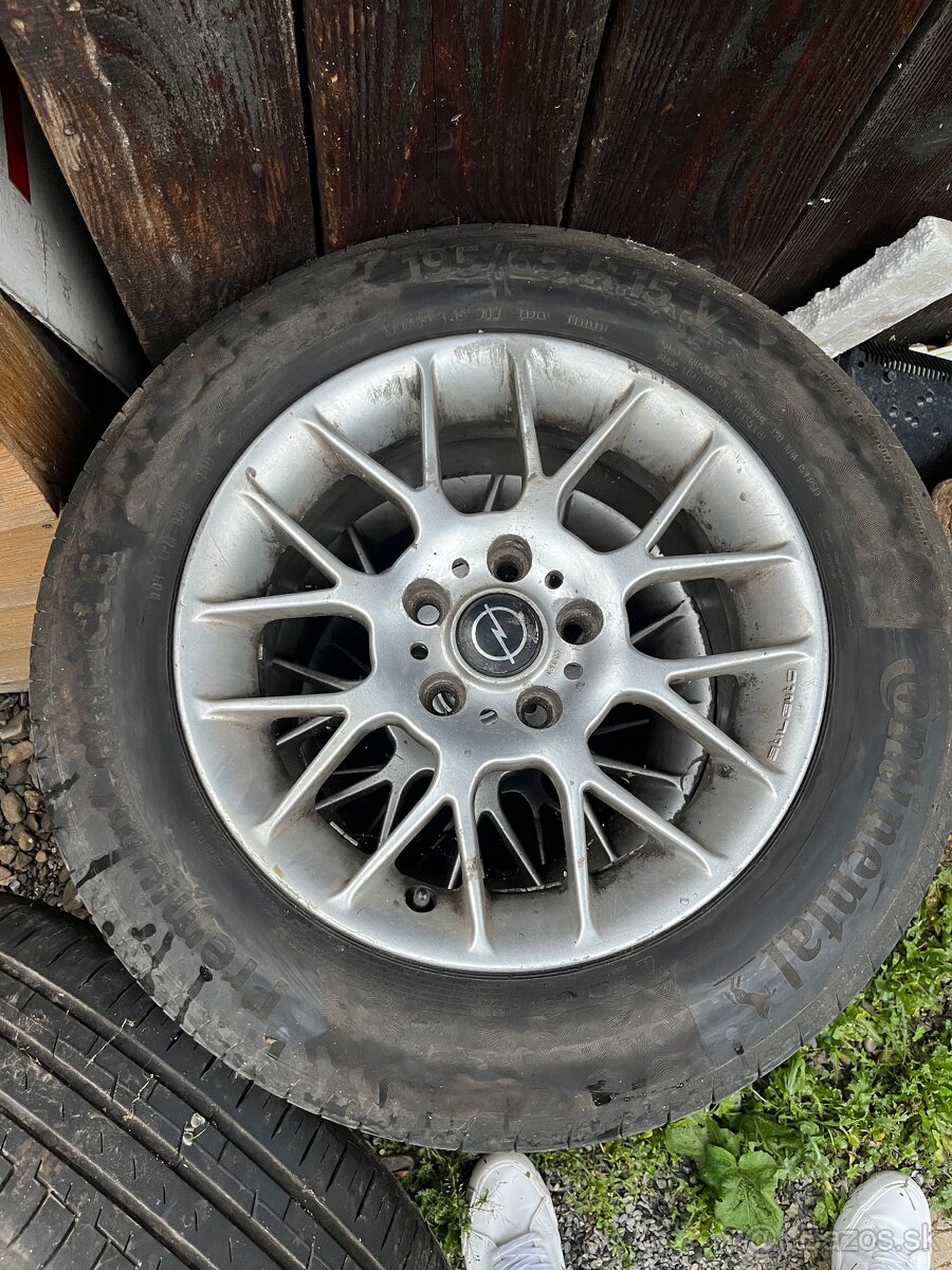 Elektrony a gumy continental 195/65 r15 v