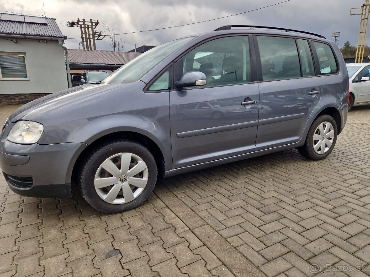 Predám Volkswagen Touran 1.9 TDI 77 KW..7-miestny,Tažné,Navi