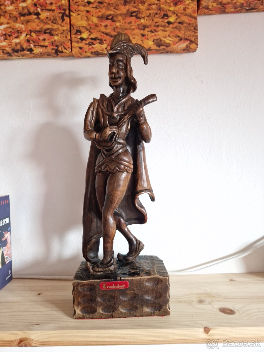 Vyřezávaný trubadur