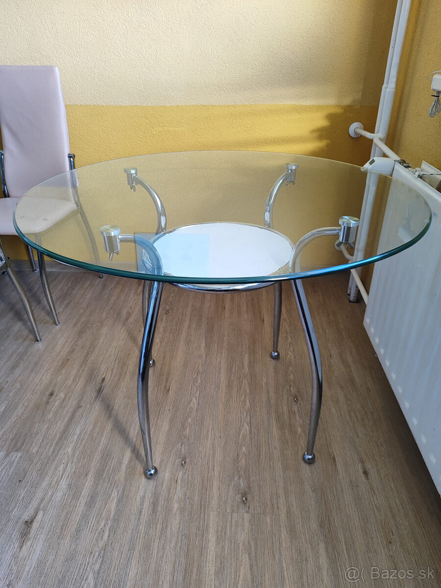 sklenený okrúhly jedálenský  stôl