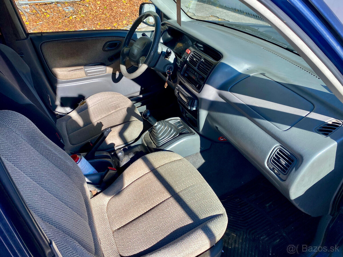 Suzuki Grand Vitara 2.0 - 10