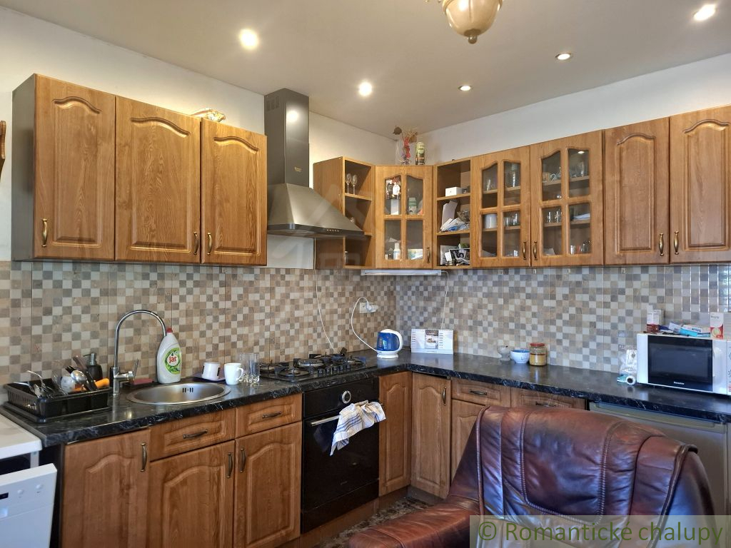 Prízemný rodinný dom v širšom centre mesta Lučenec. - 10