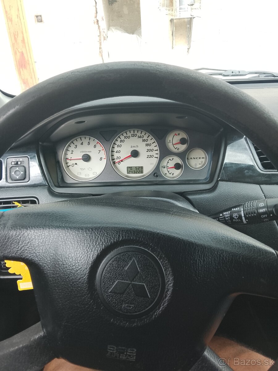 Predám mitsubishi lancer - 10