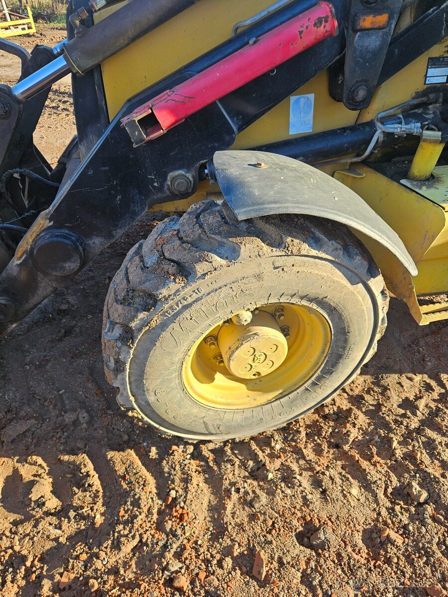 Traktorbagr Caterpillar 428D 4X4 + sbíjecí kladivo - 10