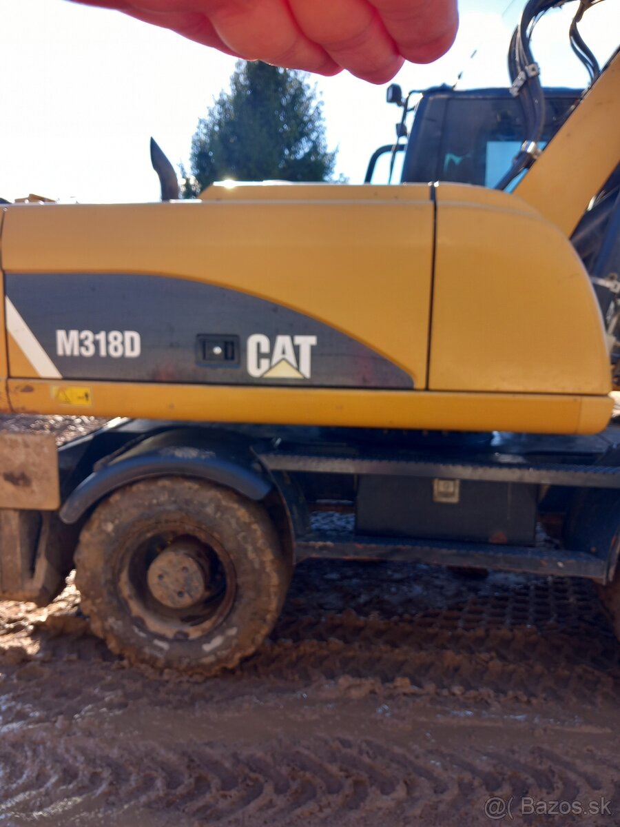 CAT 318 D - 10