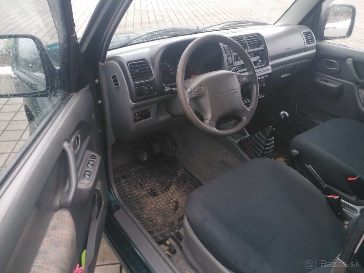 Suzuki Jimny 1.3i - 10