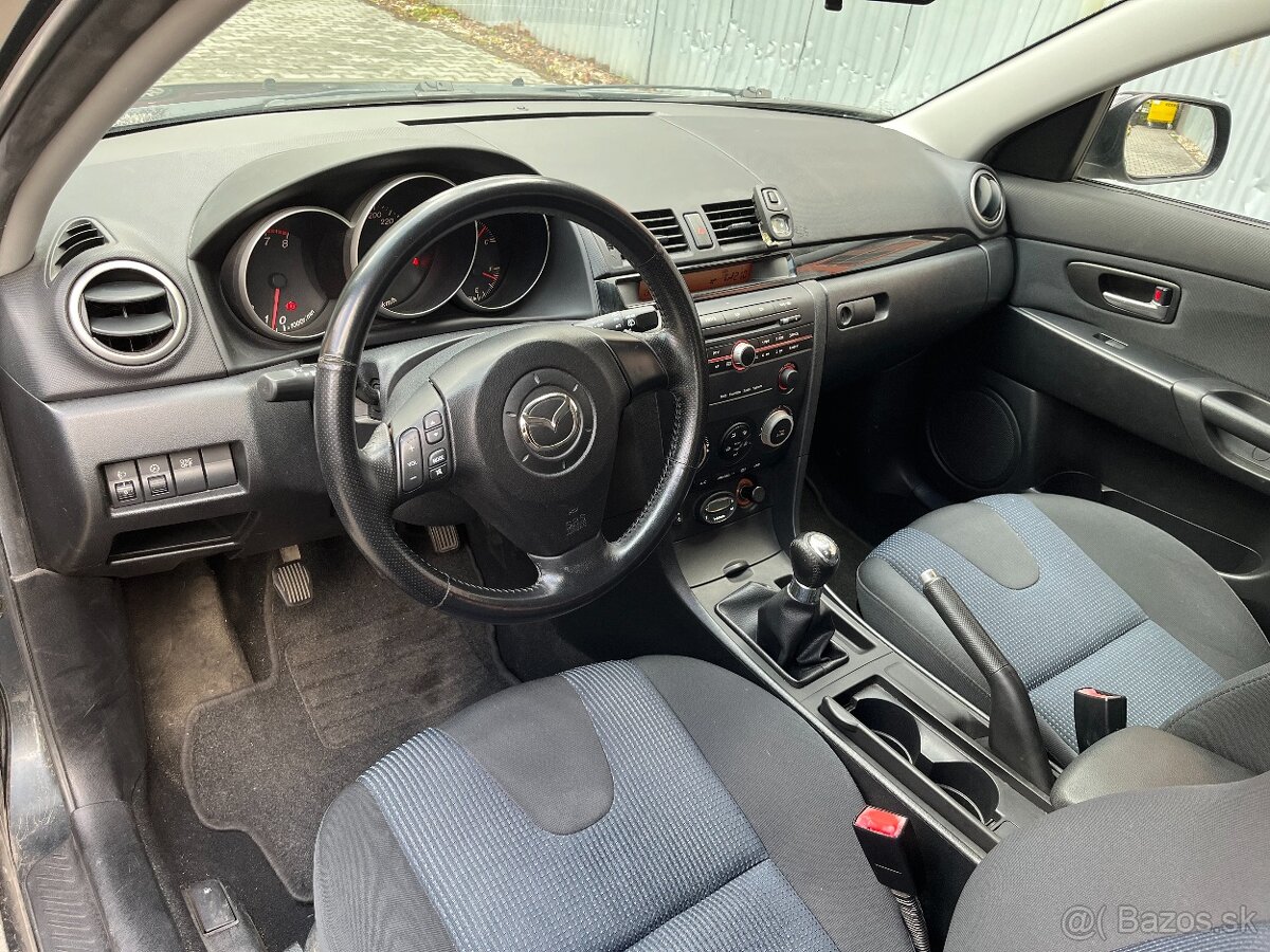 Mazda 3 1.6i. 77kW rok 2005 - 10