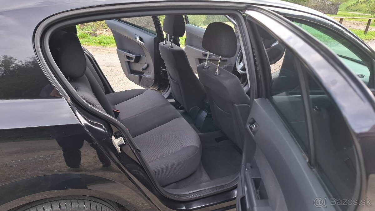 Opel astra H 1.4 16v - 10