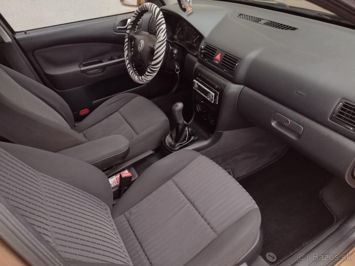 Predám Škoda Octavia 1.6i SR Elegance M5 5d S klímou - 10