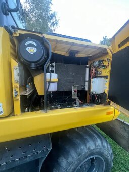 Komatsu PW 140 - 10