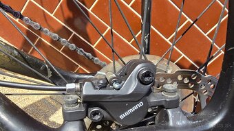 Karbon horský bicykel Kilimanjaro Shimano XT - 10