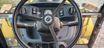 Traktorbager New Holland B110B - 10