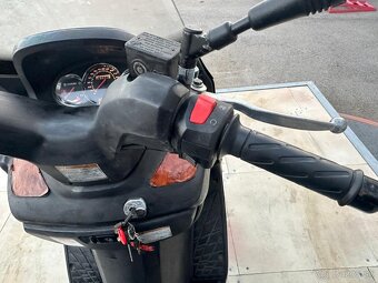 Suzuki Burgman 125 - 10