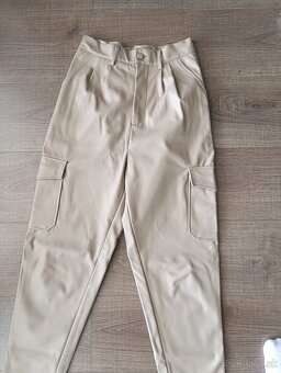 Koženkové nohavice 34 - 10