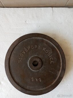 Železné kotúče/závažia 2x15kg, 2 x 20 kg,2 x 25 kg,2 x 30 kg - 10