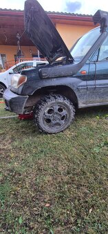 Mitsubishi pajero pinin - 10