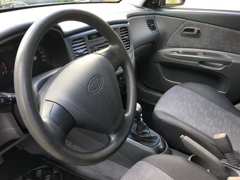 KIA RIO 1.4 i CVVT PILOT benzin 110 000KM - 10