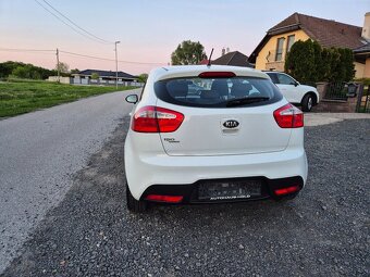 Kia rio - 10