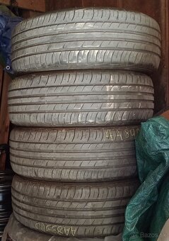 Plechové disky VW R16 + letné pneu 215/60 R16 + puklice VW - 10