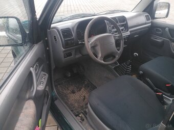 Suzuki Jimny 1.3i - 10