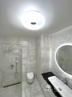 Zariadená novostavba 2 izb. byt 65,83 m2 garážové státie cen - 10