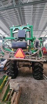 John Deere W540c, Postrekovač John Deere 740 - 10