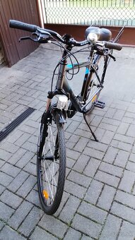 Trekingový bicykel ctm - 10