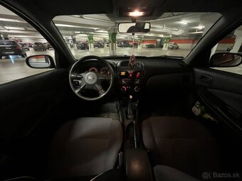 Nissan Almera 1.5 16V - 10