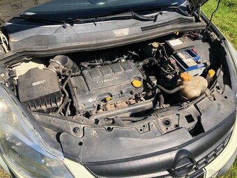 Opel Corsa D 1.4 16v - 10
