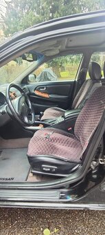 Nissan -Maxima QX - 10