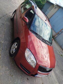 Skoda Roomster family 1.2 12v 47kw benzín rv.2008 - 10