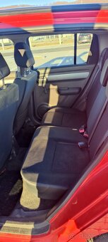 Suzuki Swift 1,3 - 10