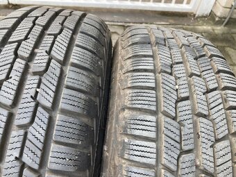 Predám sadu zimných kolies s puklicami na Ford Fiesta R14 - 10