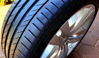 alu R18 5x112 orig. VW Passat, pneu 235/40 - 10
