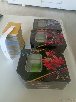 Pokémon sety - karty + plechovky - 10