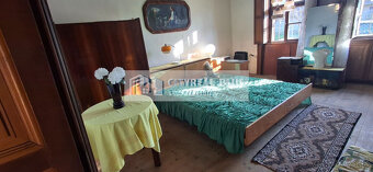 ZNÍŽENÁ CENA Ponúkame na predaj 100 ročný sedliacky dom v T - 10