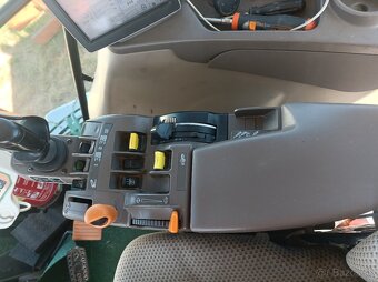 traktor John Deere - 10