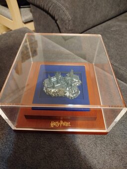 zlato striebro minca Harry Potter rokfort hrad 3D 2025 - 10