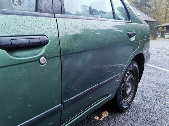 Predám Nissan Almera N15 1.4 64kW sedan - 10