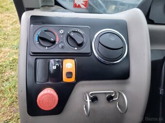 NEW HOLLAND TH 6.28 4X4 - 10